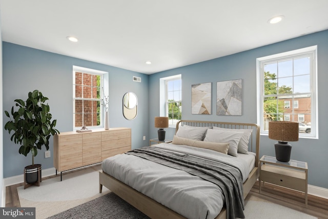 bedroom featuring wood-type flooring