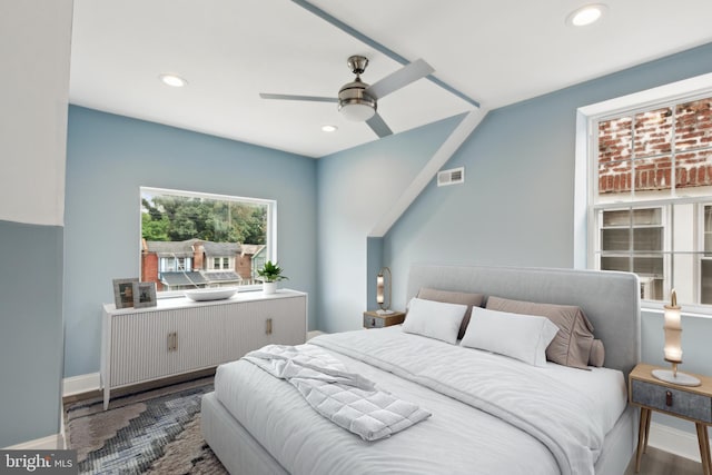 bedroom with wood-type flooring and ceiling fan