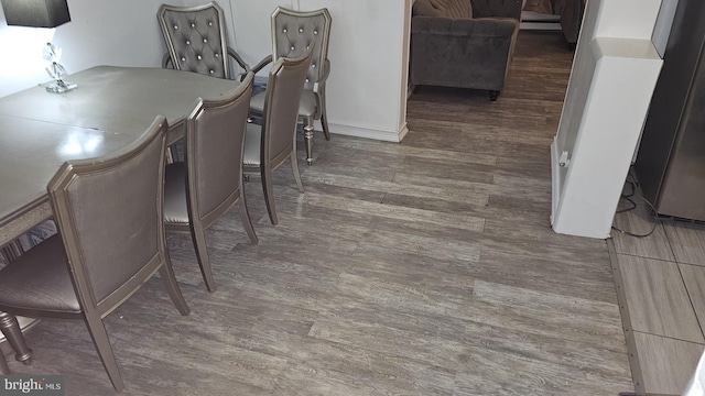 dining room featuring dark wood-type flooring