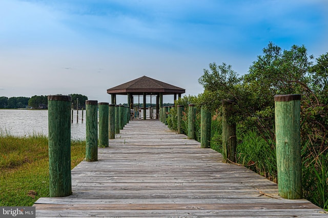 view of dock with a water view