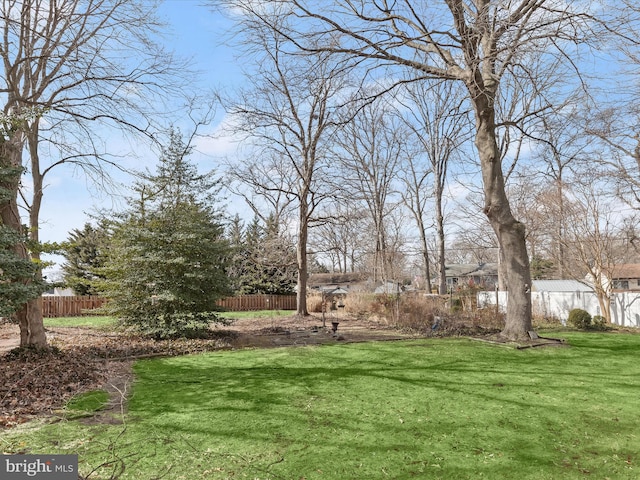 view of yard with fence