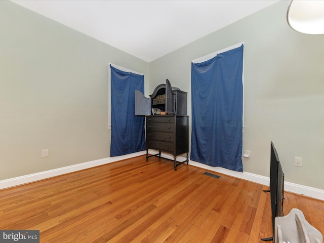 bedroom featuring hardwood / wood-style floors