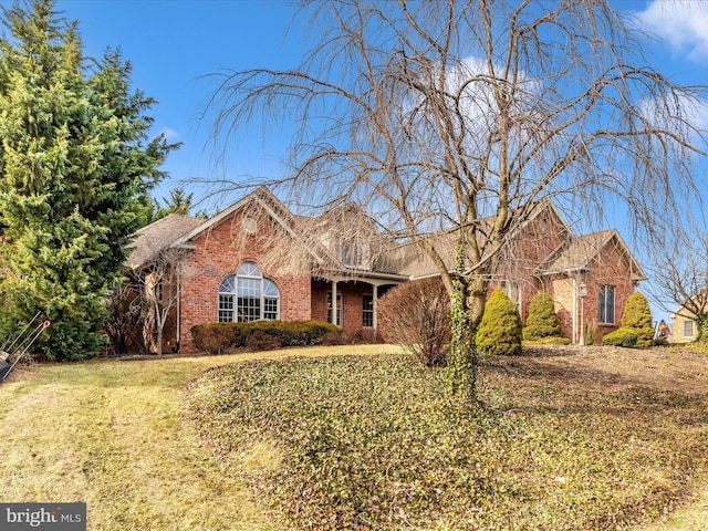 ranch-style house with a front yard