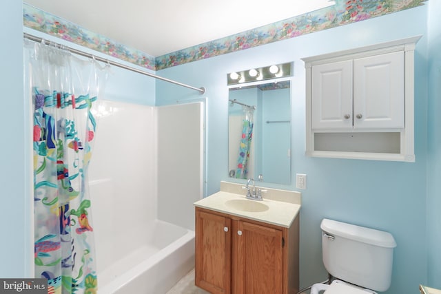 full bathroom featuring shower / bath combination with curtain, vanity, and toilet