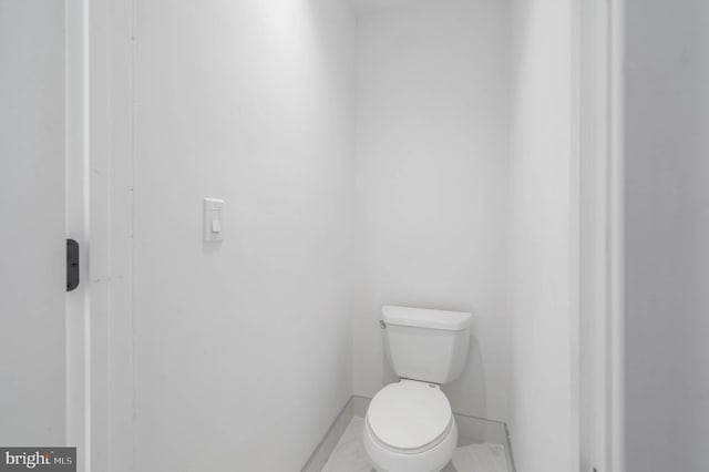 bathroom featuring toilet