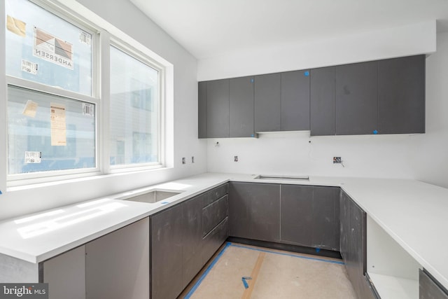 kitchen featuring sink and kitchen peninsula