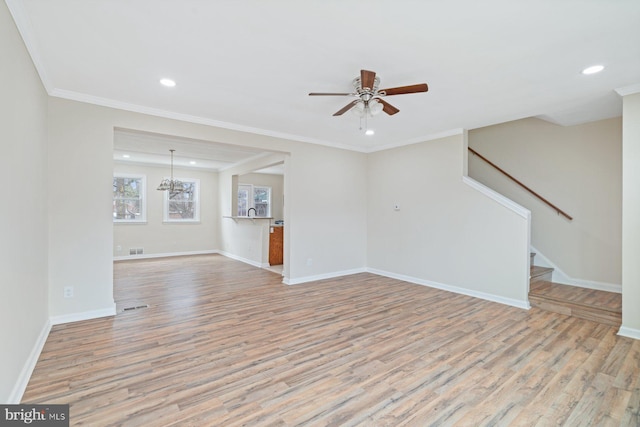 unfurnished living room with ornamental molding, ceiling fan, and light wood-type flooring