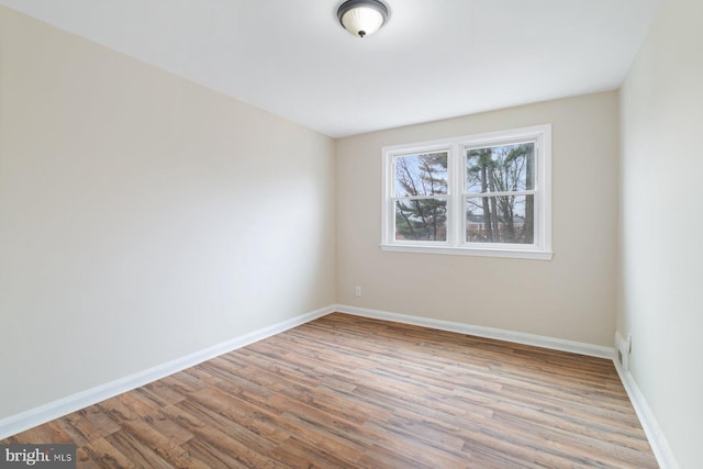 empty room with light wood-type flooring