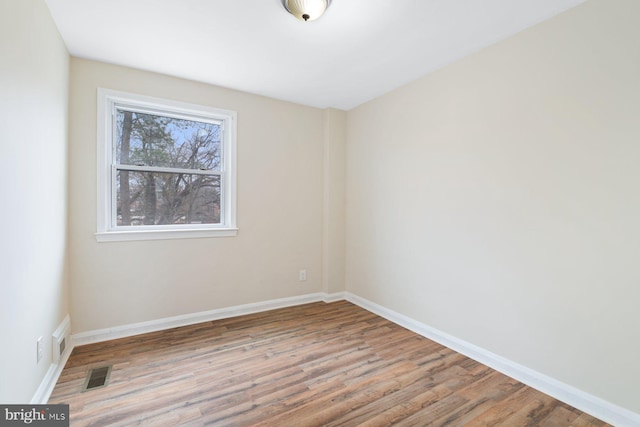 empty room featuring light hardwood / wood-style floors