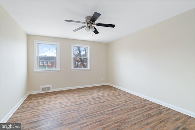 unfurnished room featuring wood-type flooring and ceiling fan