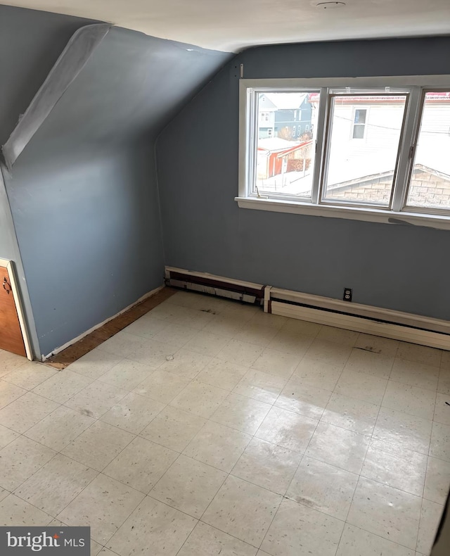 additional living space with lofted ceiling