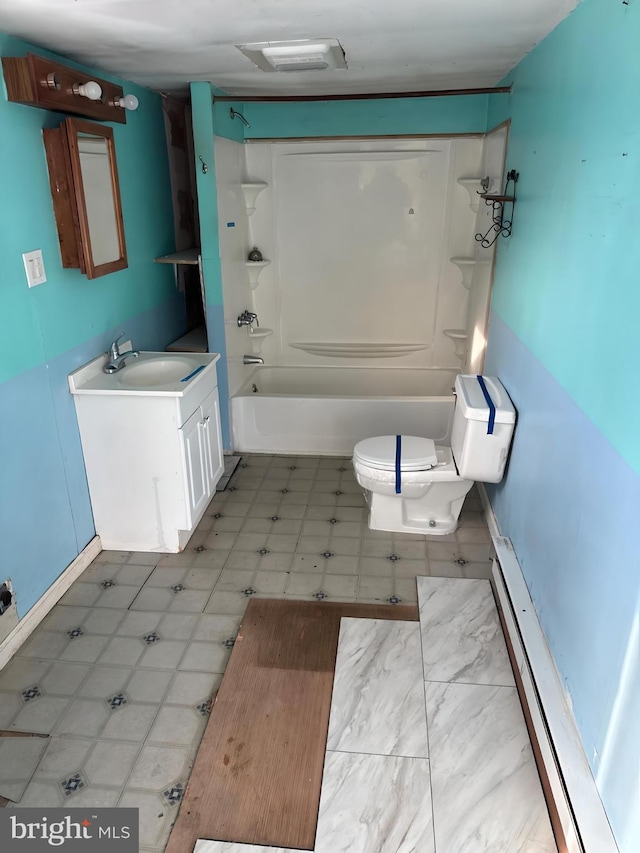 full bathroom with baseboard heating, shower / washtub combination, toilet, and vanity