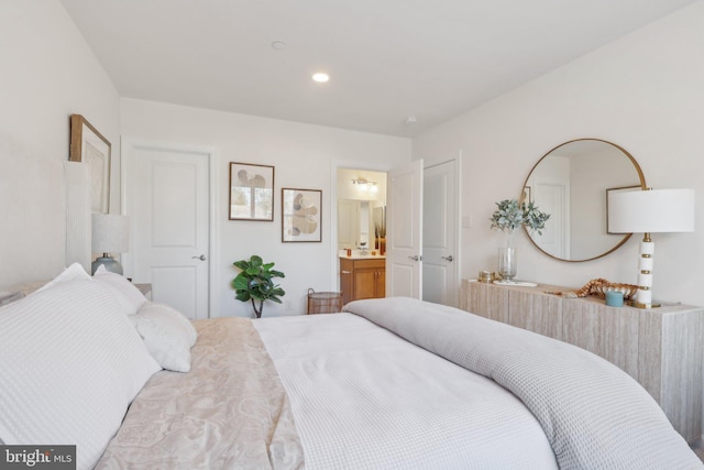 bedroom featuring ensuite bathroom