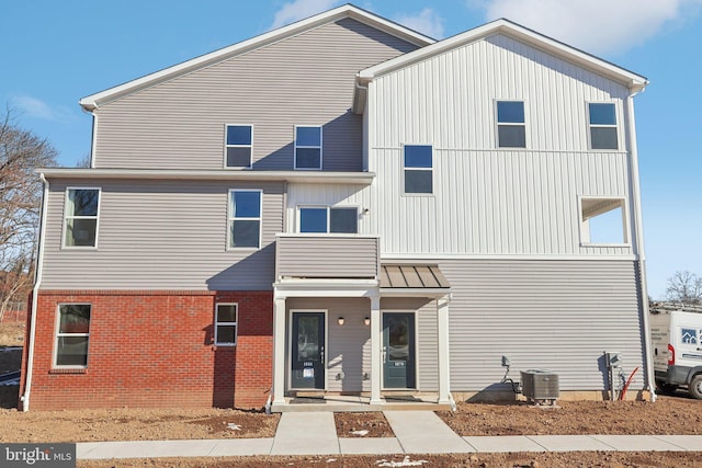 back of property with central AC unit