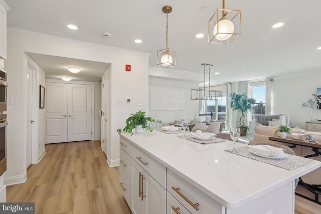 bathroom featuring hardwood / wood-style flooring and crown molding