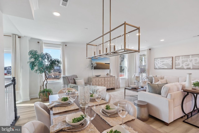 living room with light hardwood / wood-style flooring