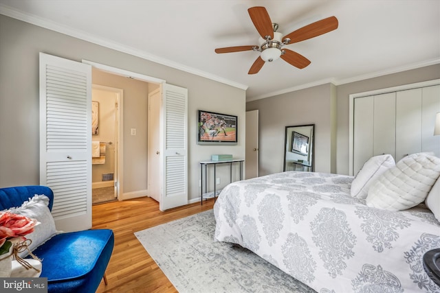 bedroom featuring ceiling fan, baseboards, a closet, light wood finished floors, and ornamental molding