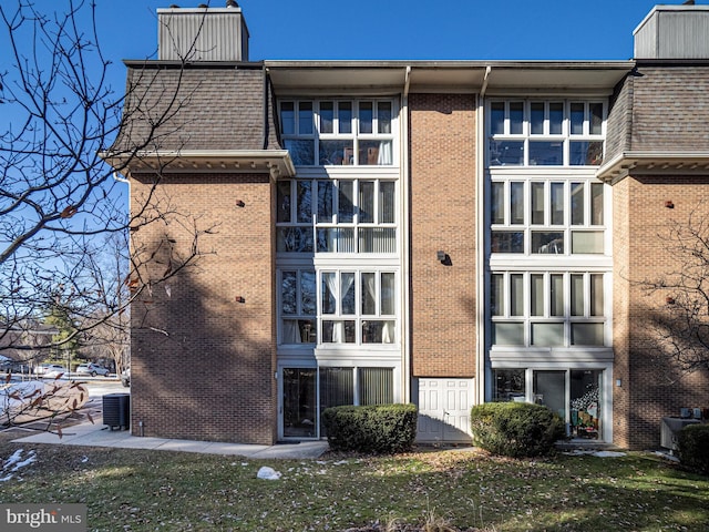 view of property exterior with central air condition unit