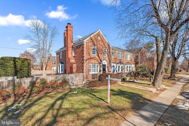 view of front of home with a front lawn