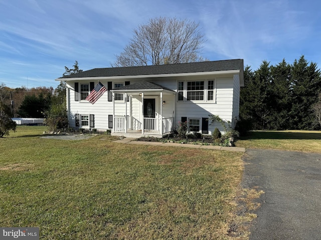 bi-level home featuring a front yard