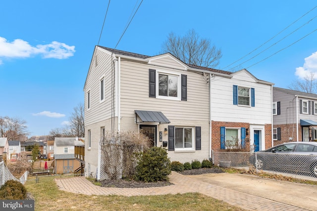 view of front of property with a front lawn