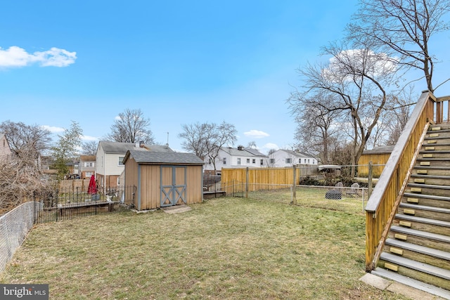 view of yard featuring a storage unit