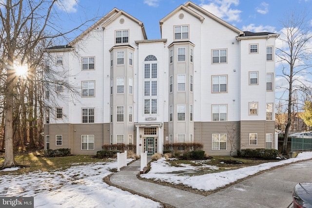 view of snow covered property