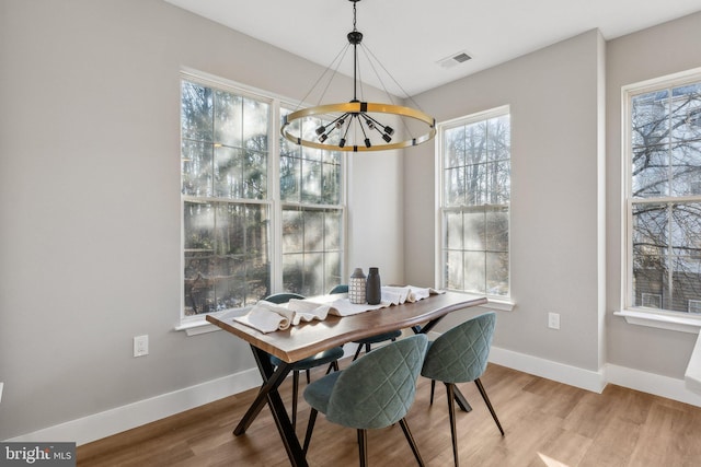 dining room featuring hardwood / wood-style flooring