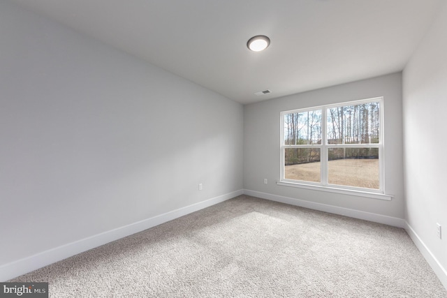 view of carpeted spare room