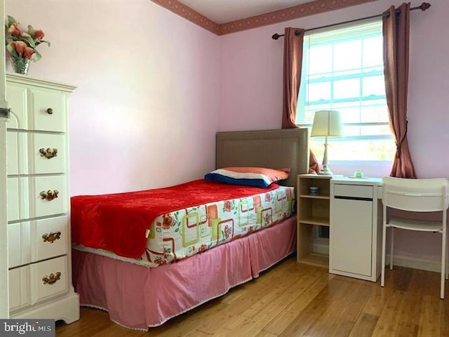 bedroom featuring light hardwood / wood-style floors