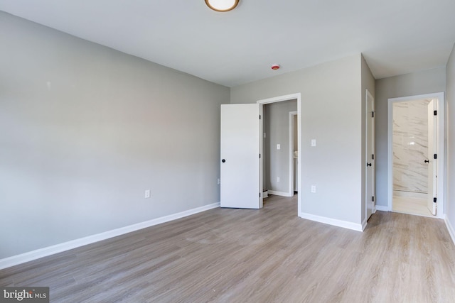 unfurnished bedroom featuring light hardwood / wood-style flooring