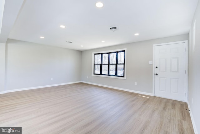 empty room featuring light hardwood / wood-style floors