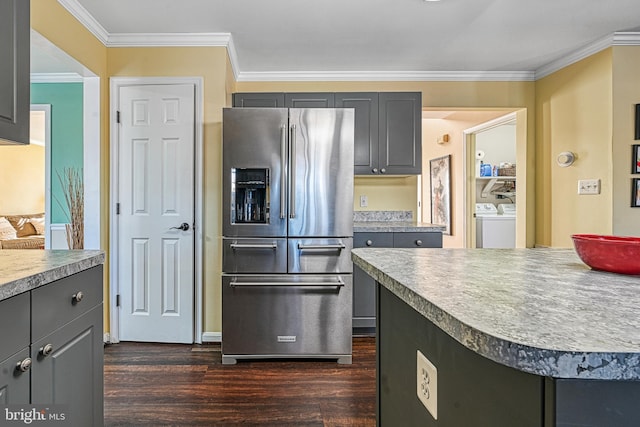 kitchen featuring crown molding, dark wood-type flooring, washer and clothes dryer, gray cabinetry, and high end refrigerator