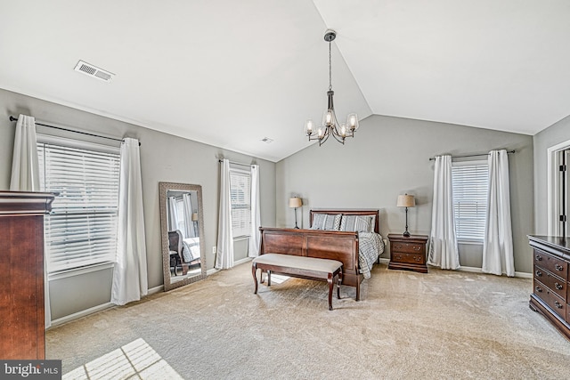 bedroom with lofted ceiling, light carpet, and a notable chandelier