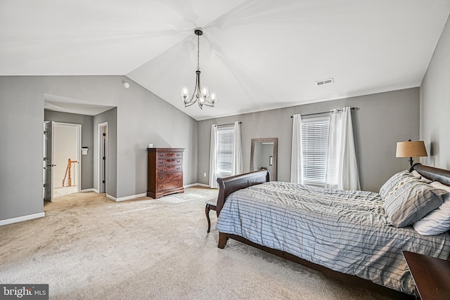 bedroom featuring an inviting chandelier, lofted ceiling, and carpet flooring