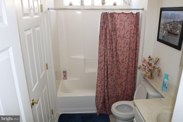 full bathroom featuring vanity, toilet, and shower / bath combo with shower curtain