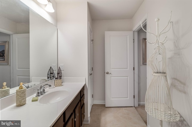 bathroom with vanity and tile patterned floors