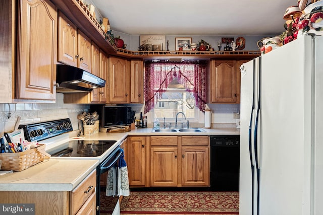 kitchen featuring sink, electric range oven, backsplash, black dishwasher, and white fridge