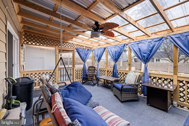 view of patio / terrace featuring an outdoor living space, ceiling fan, and a pergola