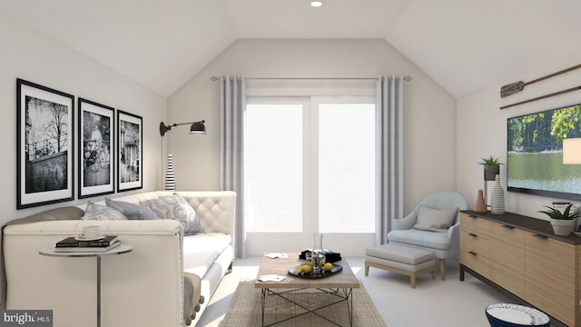 carpeted living room with lofted ceiling