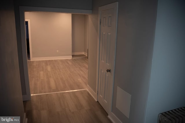 hallway featuring light hardwood / wood-style flooring