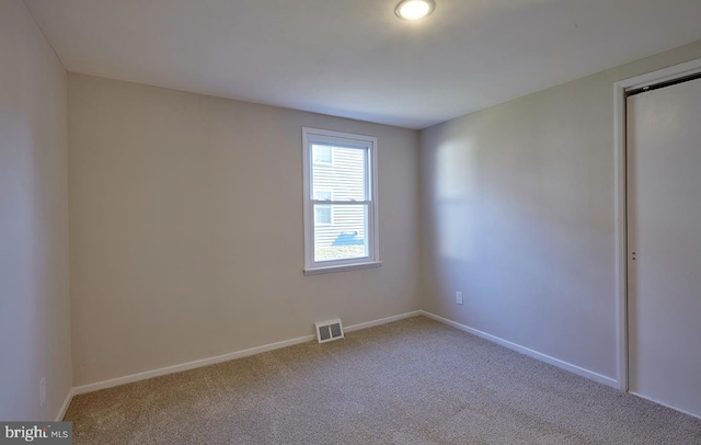 view of carpeted spare room