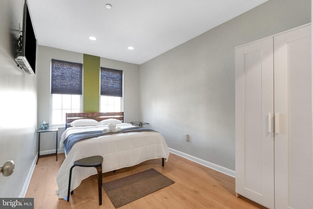 bedroom featuring light wood-type flooring