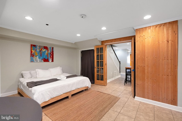 bedroom with light tile patterned floors