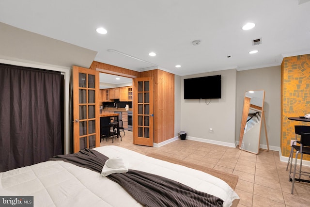 tiled bedroom with crown molding