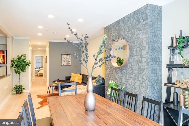 dining room with crown molding