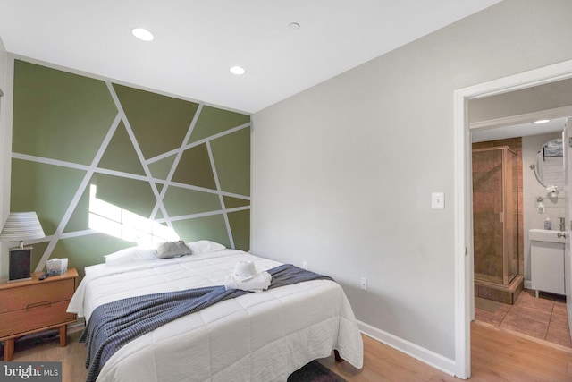 bedroom featuring hardwood / wood-style flooring