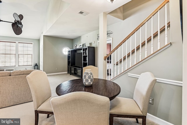 view of carpeted dining space