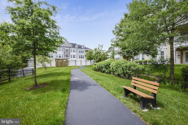 view of home's community featuring a yard