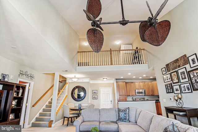 living room with a towering ceiling